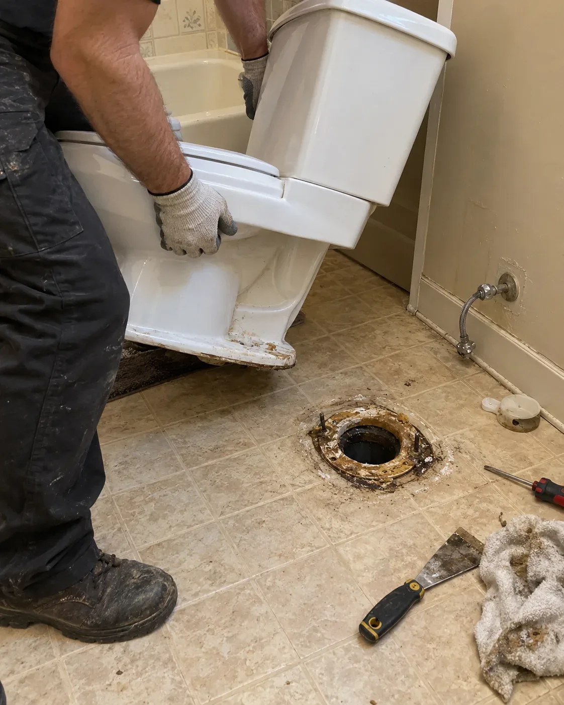 plumber-fixing-toilet